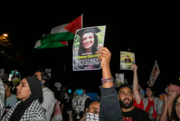 A person holds an image of Turkish-American human rights activist Aysenur Ezgi Eygi during a pro-Palestinian rally in front of the Israeli Embassy in Washington DC, USA, on 14 September 2024.